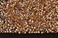 Бисер японский MIYUKI Delica цилиндр 10/0 DBM-0907 хрусталь/бронза, сверкающий/окрашенный изнутри, 5 грамм
