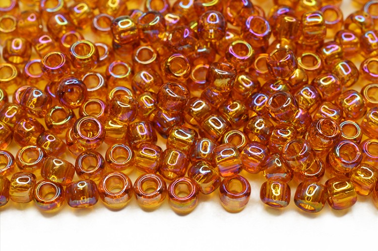 Бисер японский TOHO круглый 6/0 #0162C топаз, радужный прозрачный, 10 грамм Бисер японский TOHO круглый 6/0 #0162C топаз, радужный прозрачный, 10 грамм