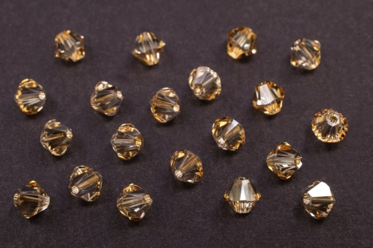 Бусина биконус Swarovski 5328 #001 GSHA 4мм Golden Shadow, 5328-4-001-205, 20шт Бусина биконус Swarovski 5328 #001 GSHA 4мм Golden Shadow, 5328-4-001-205, 20шт