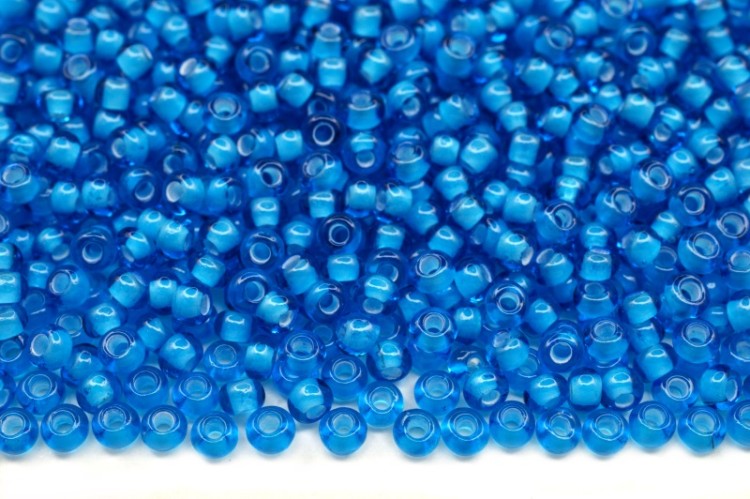 Бисер чешский PRECIOSA круглый 10/0 65156 голубой прозрачный, белая линия внутри, 20 грамм Бисер чешский PRECIOSA круглый 10/0 65156 голубой прозрачный, белая линия внутри, 20 грамм