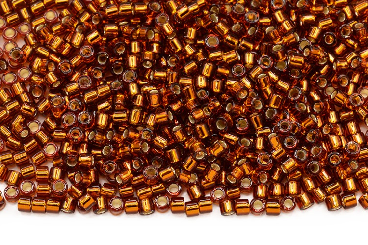 Бисер японский MIYUKI Delica цилиндр 10/0 DBM-0144 темный топаз, серебряная линия внутри, 5 грамм Бисер японский MIYUKI Delica цилиндр 10/0 DBM-0144 темный топаз, серебряная линия внутри, 5 грамм
