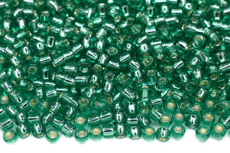 Бисер японский TOHO круглый 11/0 #0024B темный перидот, серебряная линия внутри, 10 грамм Бисер японский TOHO круглый 11/0 #0024B темный перидот, серебряная линия внутри, 10 грамм