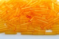 Бисер японский TOHO Bugle стеклярус 9мм #0002 светлый топаз, прозрачный, 5 грамм