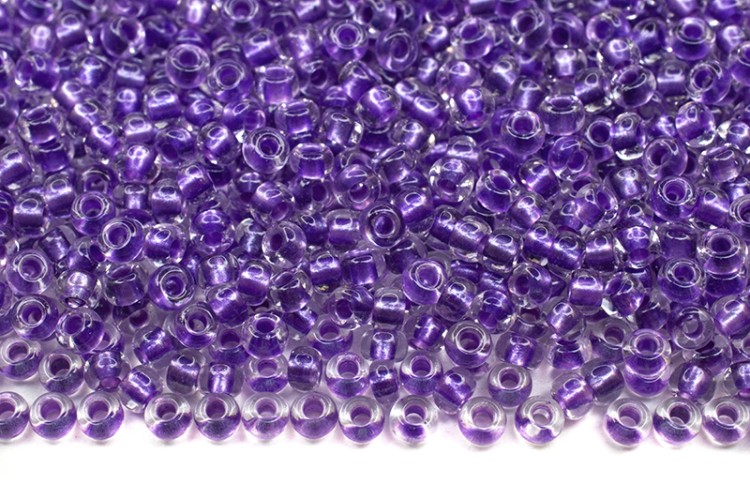 Бисер чешский PRECIOSA круглый 10/0 38928 прозрачный, фиолетовая перламутровая линия внутри, 1 сорт, 50г Бисер чешский PRECIOSA круглый 10/0 38928 прозрачный, фиолетовая перламутровая линия внутри, 1 сорт, 50г