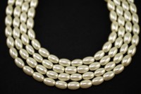 Жемчуг искусственный 9х6мм, отверстие 1мм, цвет кремовый, 517-005, 1 нить (около 20см, около 22шт)