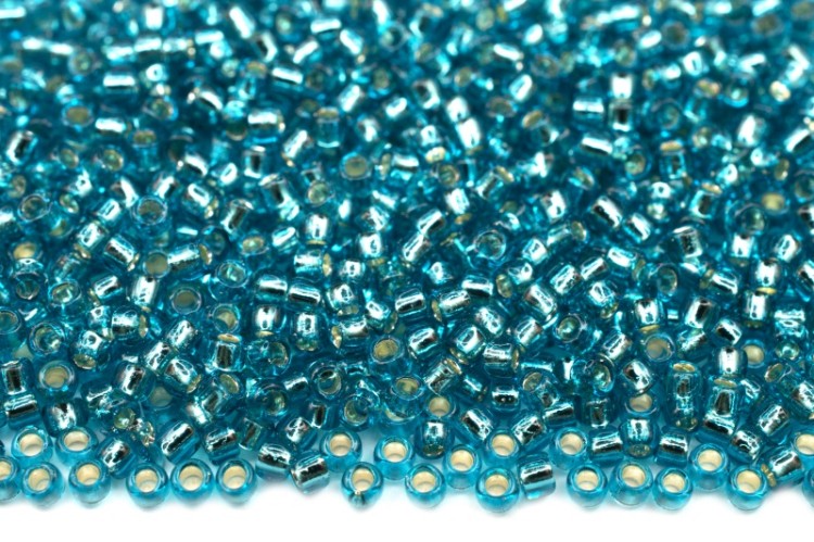 Бисер японский TOHO круглый 15/0 #0023BDA светлый аквамарин, серебряная линия внутри, 10 грамм Бисер японский TOHO круглый 15/0 #0023BDA светлый аквамарин, серебряная линия внутри, 10 грамм