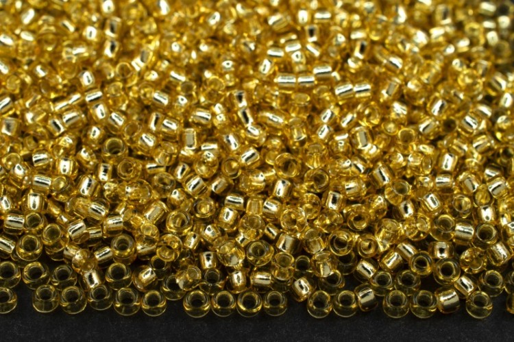 Бисер японский TOHO круглый 15/0 #0022A светлый топаз, серебряная линия внутри, 10 грамм Бисер японский TOHO круглый 15/0 #0022A светлый топаз, серебряная линия внутри, 10 грамм