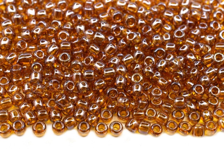 Бисер японский TOHO круглый 11/0 #0103C топаз, глянцевый прозрачный, 10 грамм Бисер японский TOHO круглый 11/0 #0103C топаз, глянцевый прозрачный, 10 грамм