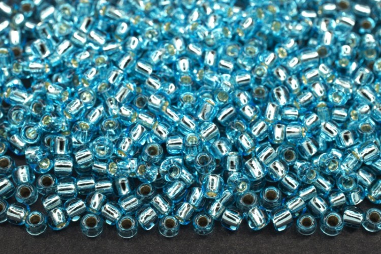 Бисер японский TOHO круглый 11/0 #0023 аквамарин, серебряная линия внутри, 10 грамм Бисер японский TOHO круглый 11/0 #0023 аквамарин, серебряная линия внутри, 10 грамм