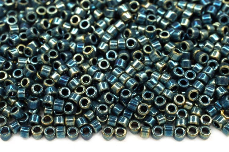 Бисер японский MIYUKI Delica цилиндр 11/0 DB-1006 сине-зеленый/золотой ирис, металлизированный, 5 грамм Бисер японский MIYUKI Delica цилиндр 11/0 DB-1006 сине-зеленый/золотой ирис, металлизированный, 5 грамм