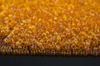 Бисер японский TOHO круглый 11/0 #0174 светлый гиацинт, радужный прозрачный, 10 грамм