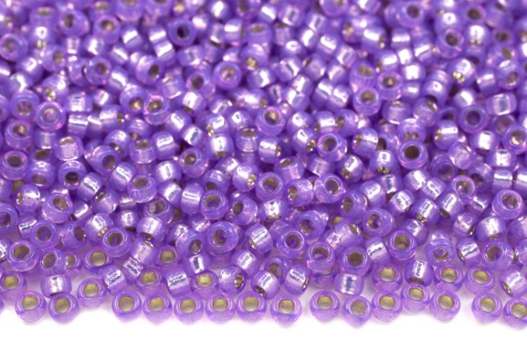 Бисер японский MIYUKI круглый 15/0 #0574 сирень, алебастр/серебряная линия внутри, 10 грамм Бисер японский MIYUKI круглый 15/0 #0574 сирень, алебастр/серебряная линия внутри, 10 грамм